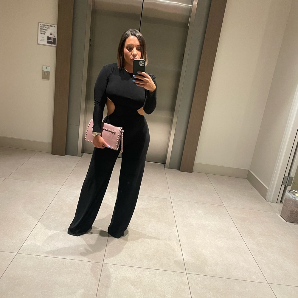 NORMA KAMALI
Long Sleeve Side Cut Out Jumpsuit